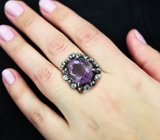 Серебряное кольцо с аметистом 13,28 карата и голубыми топазами