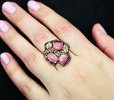 Серебряное кольцо с корундами и голубыми топазами