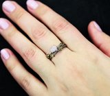 Серебряное кольцо с кристаллическим эфиопским опалом и диопсидами