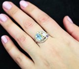 Серебряное кольцо с голубым топазом и аметистом
