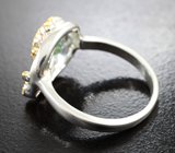 Серебряное кольцо с голубым топазом и аметистом