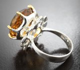 Серебряное кольцо с цитрином и голубыми топазами