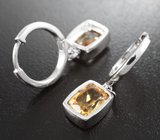 Стильные серебряные серьги с цитринами