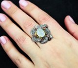 Серебряное кольцо с лунным камнем и родолитами