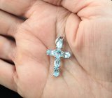 Серебряный кулон-крест с голубыми топазами