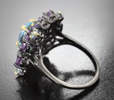 Серебряное кольцо с голубым топазом и аметистами