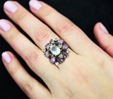 Серебряное кольцо с голубым топазом и аметистами
