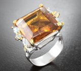 Серебряное кольцо с крупным цитрином и голубыми топазами