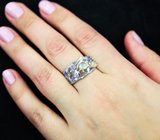 Серебряное кольцо с ограненными эфиопскими опалами и танзанитами