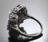 Серебряное кольцо с голубыми топазами и аметистами
