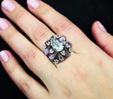 Серебряное кольцо с голубыми топазами и аметистами