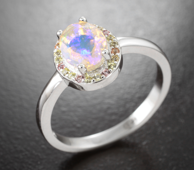 Праздничное серебряное кольцо с ограненным эфиопским опалом и разноцветными сапфирами