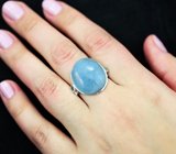 Серебряное кольцо с крупным аквамарином и голубыми топазами