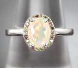 Серебряное кольцо с ограненным эфиопским опалом и разноцветными сапфирами