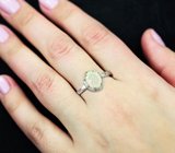 Серебряное кольцо с ограненным эфиопским опалом и разноцветными сапфирами
