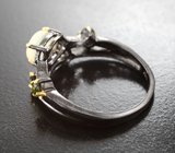 Серебряное кольцо с кристаллическим эфиопским опалом и диопсидами