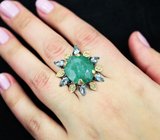 Серебряное кольцо с крупным изумрудом 10,82 карата и голубыми топазами