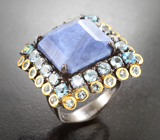 Серебряное кольцо с синим агатом и голубыми топазами Серебро 925