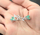 Изысканная серебряная брошь с изумрудами