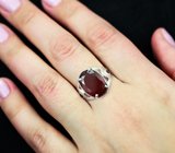 Серебряное кольцо c крупным спессартином и родолитами