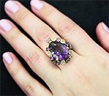 Серебряное кольцо с аметистами и голубыми топазами