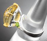 Серебряное кольцо с крупным цитрином авторской огранки и перидотами