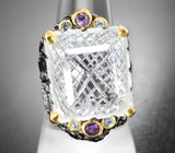 Серебряное кольцо с резным бесцветным кварцем, аметистом и голубыми топазами