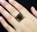 Серебряное кольцо с крупным цитрином и голубыми топазами