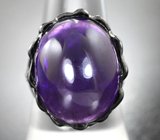 Серебряное кольцо с крупным сливовым аметистом и голубыми топазами