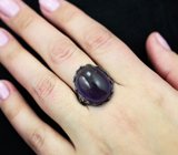 Серебряное кольцо с крупным сливовым аметистом и голубыми топазами