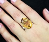 Серебряное кольцо с цитрином и бесцветными топазами