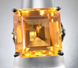 Серебряное кольцо с крупным цитрином и бесцветными топазами