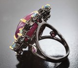 Серебряное кольцо с крупным корундом 22,47 карата, аметистами и голубыми топазами