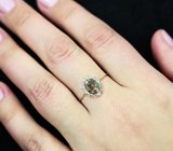 Золотое кольцо с ярким ограненным черным опалом топового качества 0,61 карата и лейкосапфирами