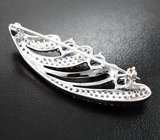 Изысканная серебряная брошь с голубыми топазами