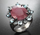 Серебряное кольцо с крупным насыщенным рубином 11,39 карата и голубыми топазами