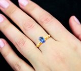 Золотое кольцо с чистейшим танзанитом топового цвета 0,95 карата, сапфирами и бриллиантами