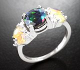 Серебряное кольцо с ограненными черным и белыми эфиопскими опалами