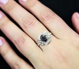 Эффектное серебряное кольцо с насыщенно-синим сапфиром