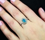 Серебряное кольцо с ограненным опалом и разноцветными сапфирами