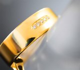 Уникальное золотое кольцо «Инь-Ян» со свободно «гуляющими» бриллиантом и черной шпинелью под сапфировым стеклом