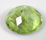 Крупный перидот с включениями рутила 17,51 карата