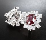 Оригинальные серебряные серьги с яркими насыщенными рубинами