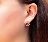 Оригинальные серебряные серьги с яркими насыщенными рубинами