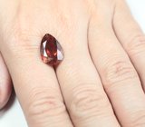 Крупный красно-оранжевый турмалин 6,17 карата