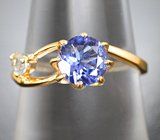 Золотое кольцо с ярким насыщенным танзанитом 0,82 карата и бесцветным топазом