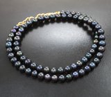 Золотое колье с калиброванным черным морским жемчугом 95,95 карата