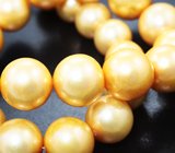 Массивное золотое колье с крупным золотистым пресноводным жемчугом барокко 567,45 карата