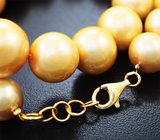 Массивное золотое колье с крупным золотистым пресноводным жемчугом барокко 567,45 карата