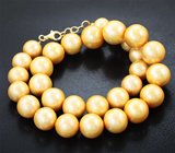 Массивное золотое колье с крупным золотистым пресноводным жемчугом барокко 567,45 карата